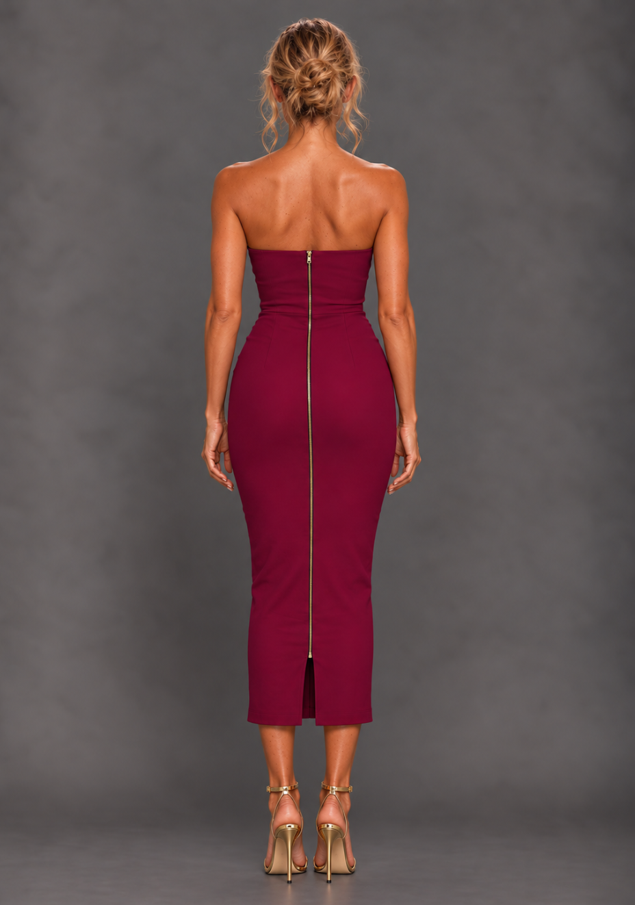 Back image of a model wearing the VSPR Marion Sweetheart Neckline Berry Midaxi Dress, on a model, highlighting its figure-contouring shape and sophisticated berry finish against a grey studio backdrop.