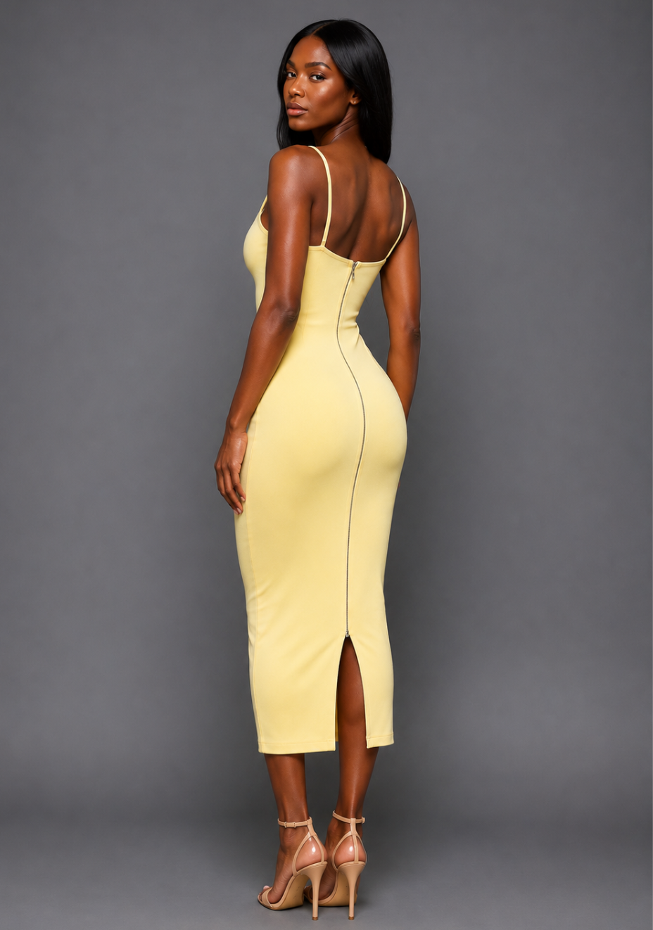 Side back image of a model wearing the VSPR Nixi Square Neckline Midaxi Dress in Lemon, showcasing the flattering fitted shape, delicate straps, and premium stretch fabric against a grey studio backdrop