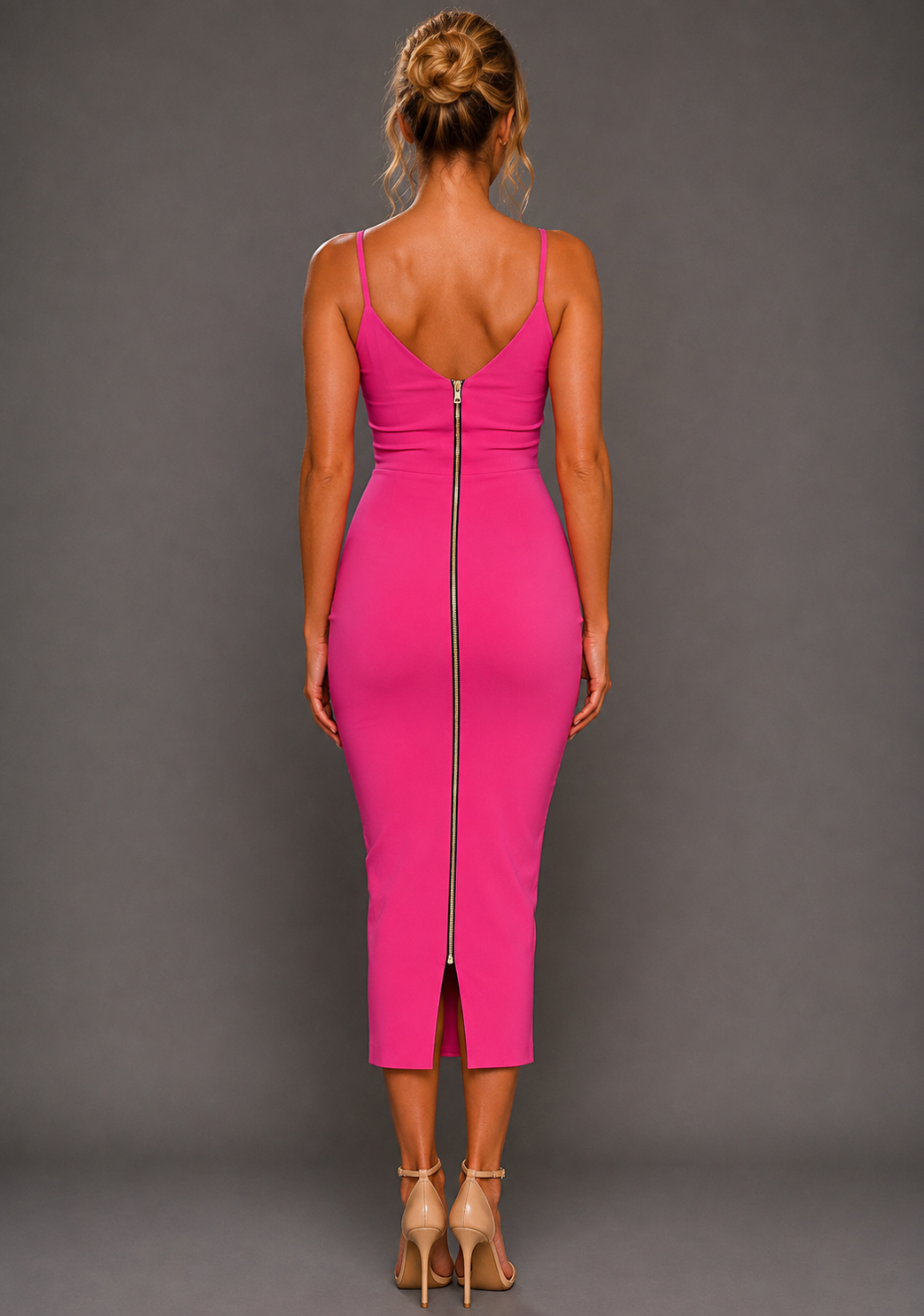 Back image of a model wearing the VSPR Rea Plunge Neck Bodycon Midaxi Dress in Cerise, featuring the statement gold centre-back zip and sleek straight hem.
