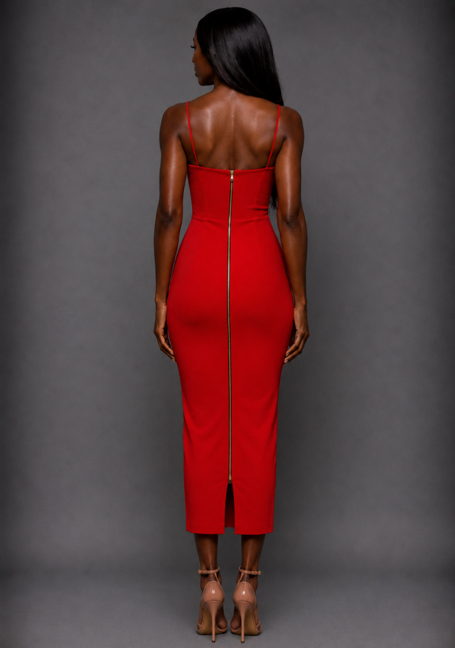 Back image of a model wearing the VSPR Roxanne Front Cut Out Cami Strap Midaxi Dress in Red, showcasing the sleek fitted silhouette and delicate cami straps against a grey studio backdrop.