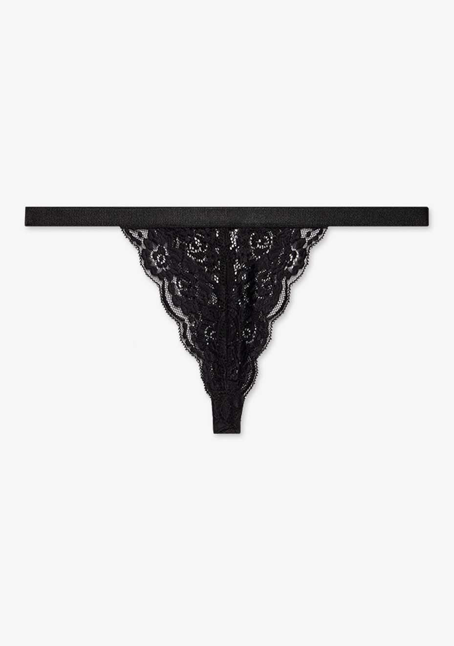 Orla black lace thong with intricate flower patterns, displayed against a minimalistic white surface.